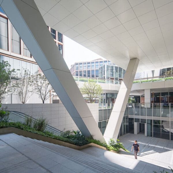 finance center's undercut building bases by AI planetworks form communal hub in shanghai