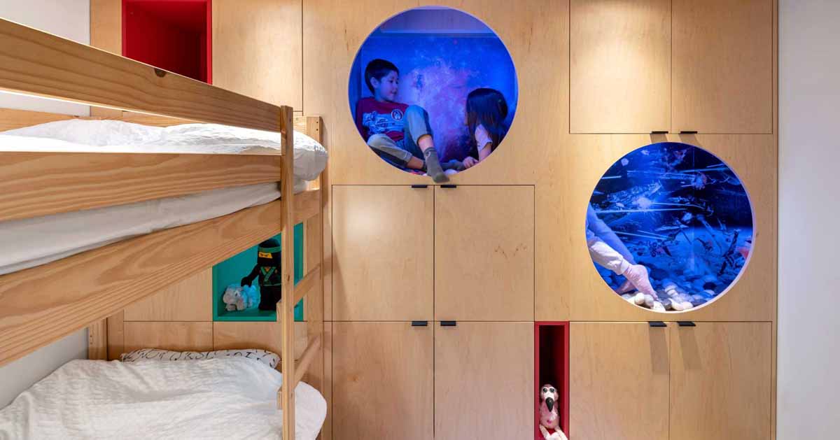 A Kid's Bedroom With Built-In Reading Nooks