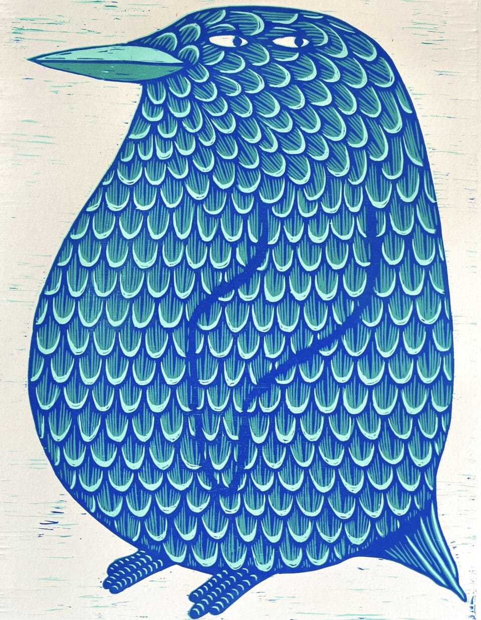 a woodblock print of a plump penguin in blue and teal. its feathers are patterned with lines