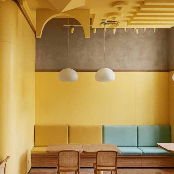 A Yellow Interior Sets The Tone For This Cafe