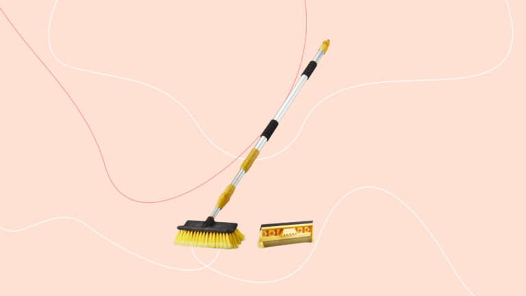 easy clean telescopic hose brush and squeegee on a pink graphic background
