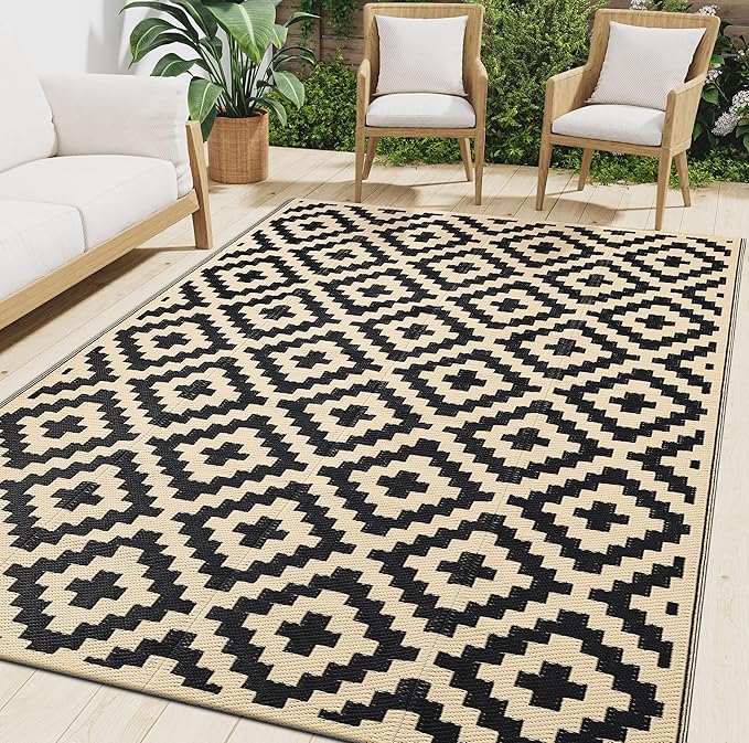 smiry outdoor rug in black and beige