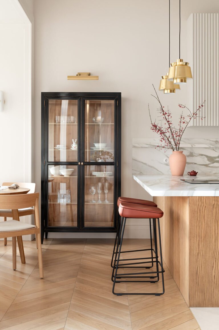 glass front cabinetry with black build