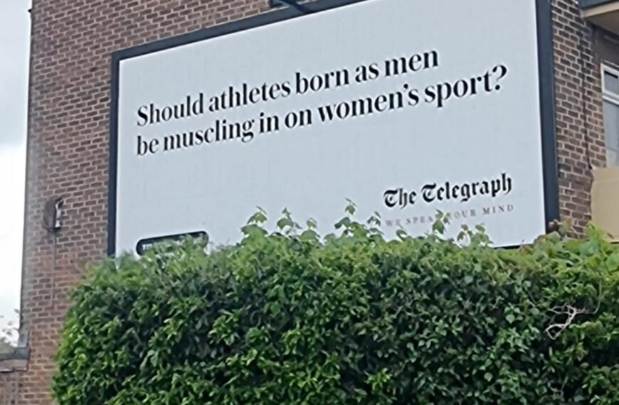 Artist Covers Transphobic Billboard With Giant Dachshund Drawing