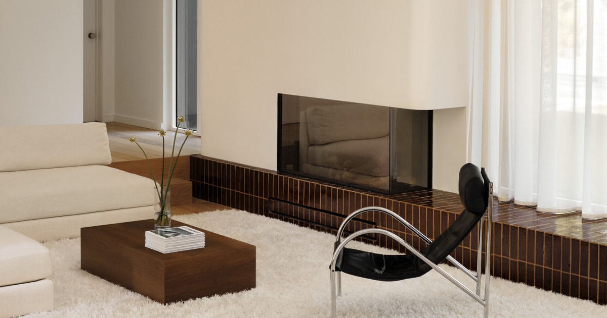At First It Looks Simple, Then You Notice the Curved Fireplace and Built-In Lounge