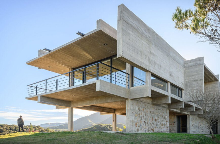 cristian nanzer’s el dragón house rises from cyclopean stone base
