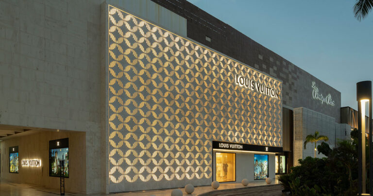 louis vuitton's cancun boutique unveils concrete facade with sculpted flower motif