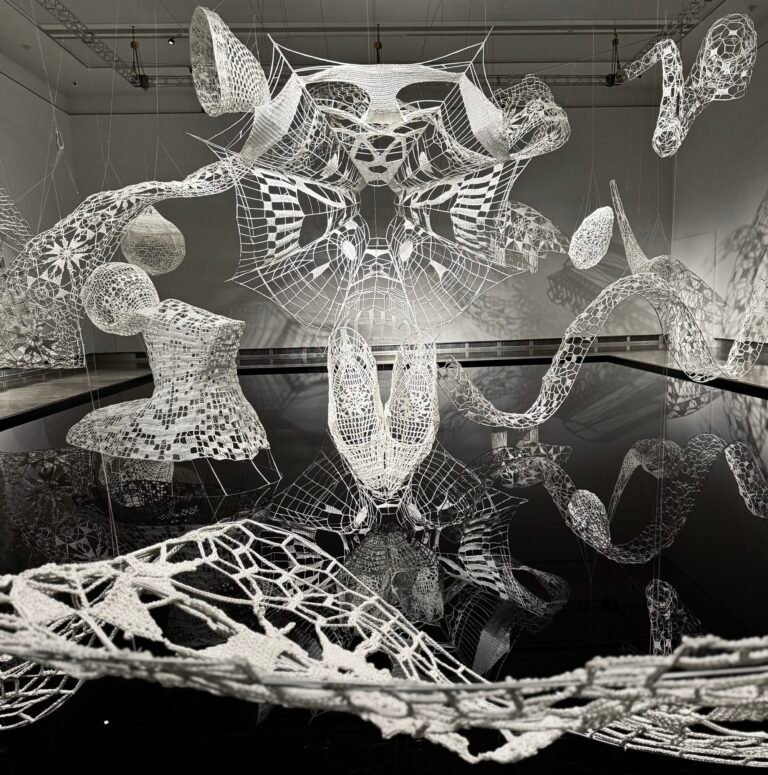 a large-scale installation of white fiber by Choi + Shine