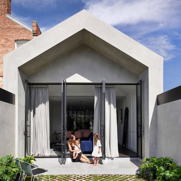 A Victorian-era home is renovated with a modern extension and a hidden indoor garden that brings light, greenery and connection into the centre of family life.