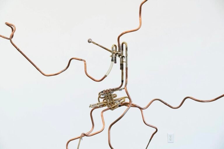 a sound sculpture by Steve Parker with sprawling metal tubing