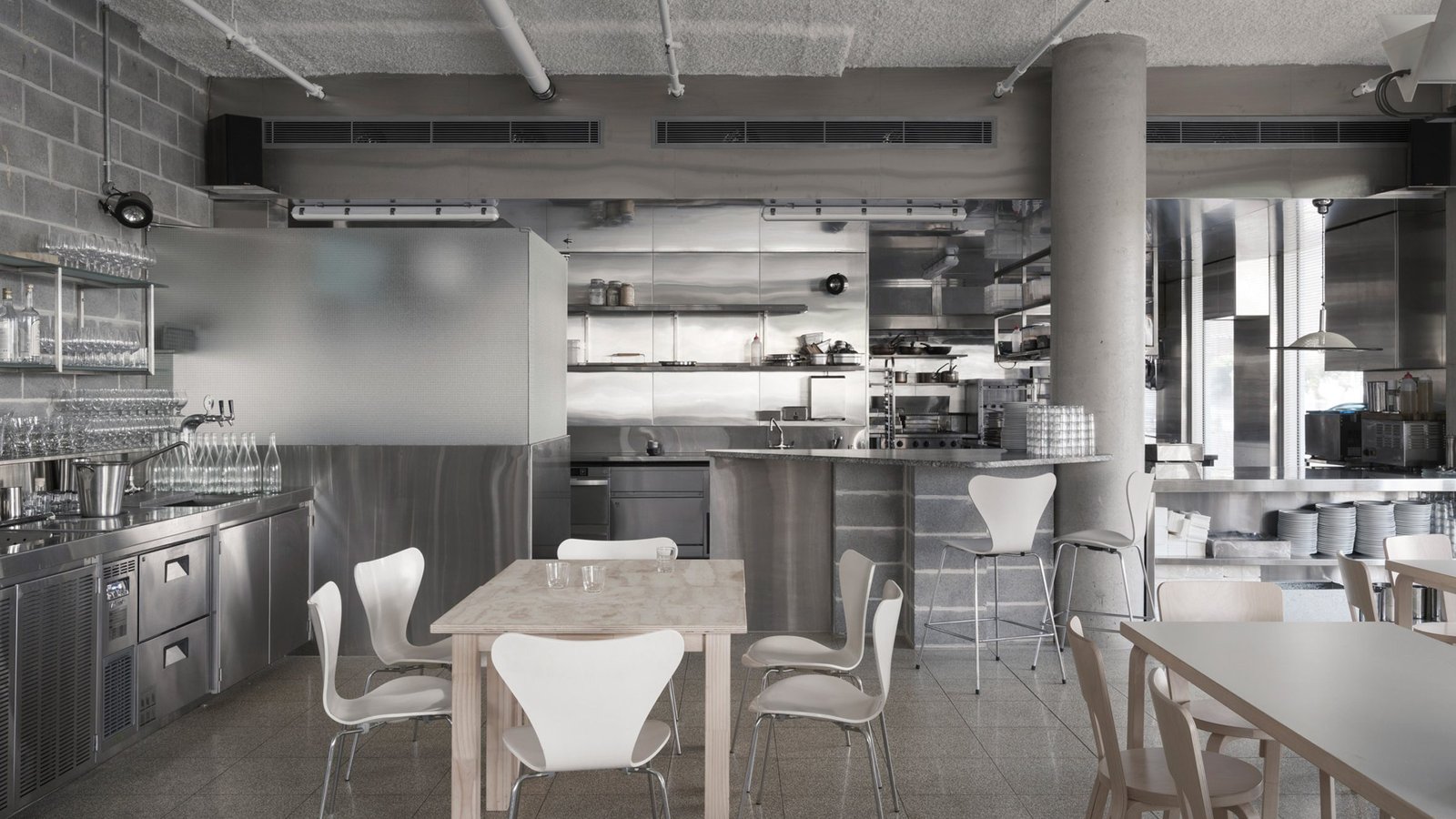 Kitchen with concrete and metal surfaces