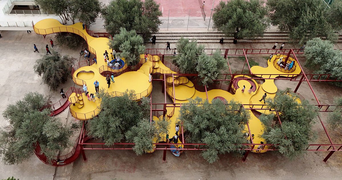 ZAV architects weaves yellow playground through olive orchard in iran 1 ZAV architects weaves yellow playground through olive orchard in iran