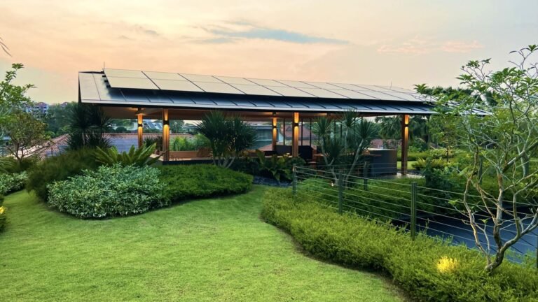 Sky Pavilion House by Guz Architects transforms an unusual Singapore site into a lush garden-focused home with a rooftop pavilion, glass staircase, swimming pool, and smart passive cooling features. Discover how greenery, natural breezes, and tropical design come together in this stunning residence.