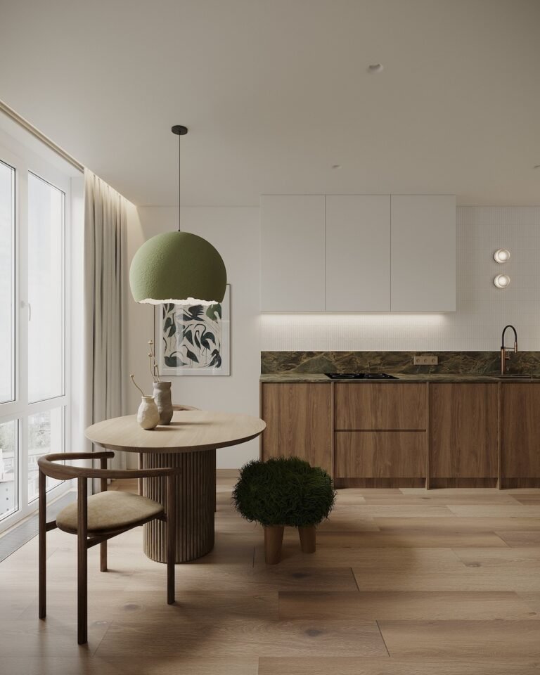 إعادة تعريف البساطة المستوحاة من الطبيعة في الملاذ الأخضر 4 small dining space in open kitchen