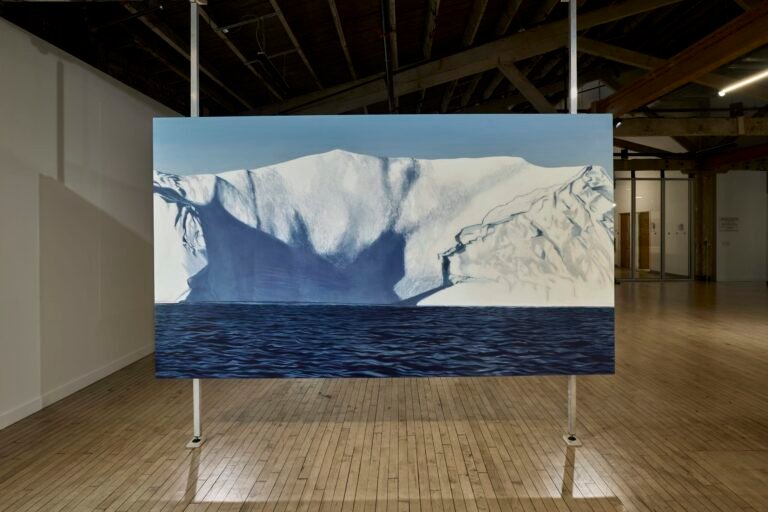 a painting of an aerial view of an iceberg