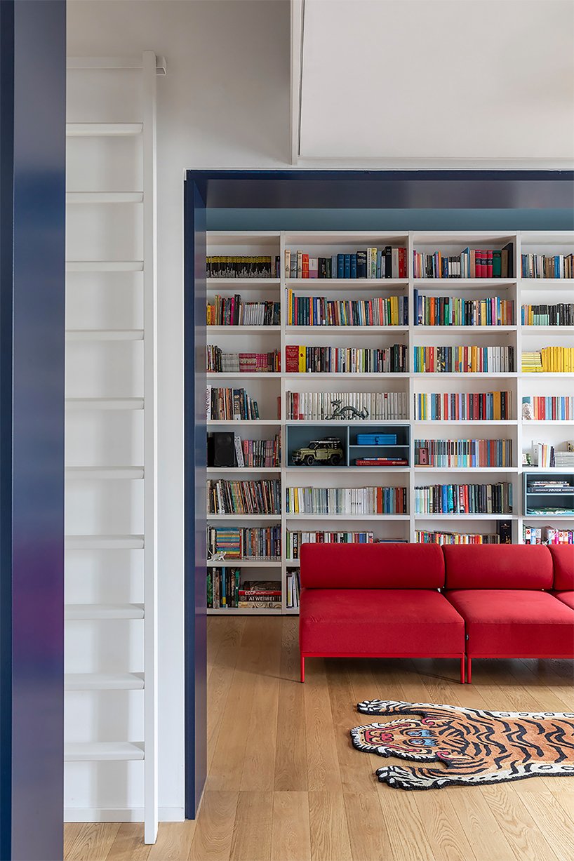 dka renovates roman apartment with brick vaults and blue joinery
