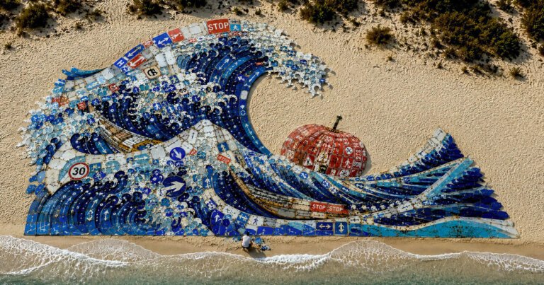 discarded road signs transform into monumental land art installation in sardinia 1 discarded road signs transform into monumental land art installation in sardinia
